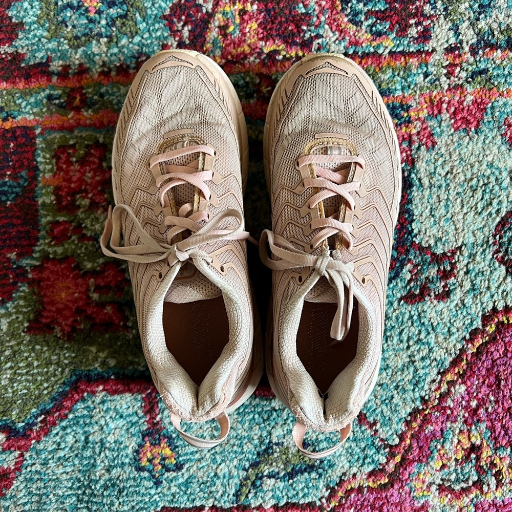 Pink Hoka Clifton 4 running shoes